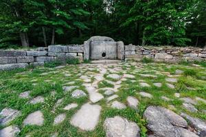 Ancient tiled dolmen in the valley of the river Jean. Monument of archeology megalithic structure photo