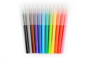 Multi-colored felt-tip pens, markers on a white isolated background photo