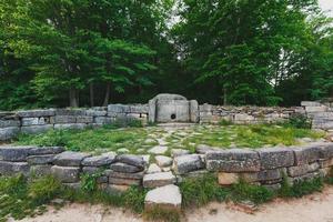 Ancient tiled dolmen in the valley of the river Jean. Monument of archeology megalithic structure photo