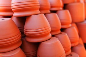 Handmade ceramic crockery made of clay of brown terracotta color photo