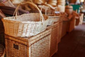 Handmade wicker furniture, products and souvenirs at the street craft market. photo