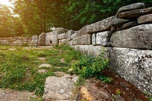 Ancient tiled dolmen in the valley of the river Jean. Monument of archeology megalithic structure photo