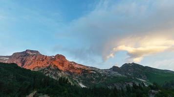 Scarlet high rocky mountain at sunset. Caucasian reserve, mountain Fisht, Krasnodar region photo