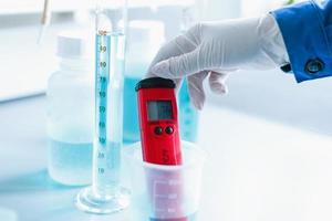 Analysis of water quality in a chemical laboratory, a device for measuring pH with equipment made of glass photo