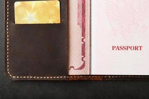 Open Passport Leather Cover with Gold Credit Card photo