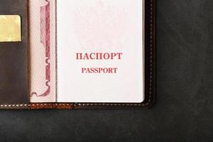 Open Passport Leather Cover with Gold Credit Card photo