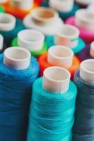 Colorful spools of sewing thread. Colored thread for sewing photo