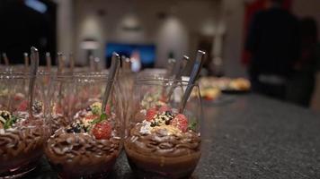 Set of beautiful canapes on black stone plates. Buffet table. Catering in cinematic video. video