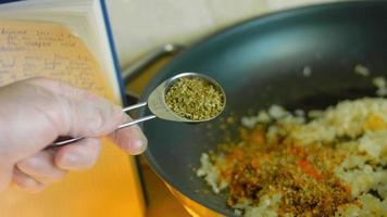 Mix the ingredients for the chorizo and the preserved tomatoes with a wooden spoon. Macro shooting video