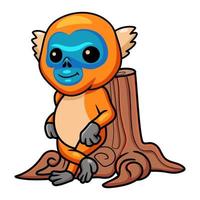 Cute little golden monkey cartoon leaning in tree stump vector