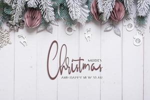 Merrry Christmas and Happy new year greeting text with composition flat lay on wooden background photo