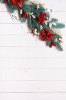 Christmas composition made from pine tree, stars and festive decorations top view. Christmas flat lay photo