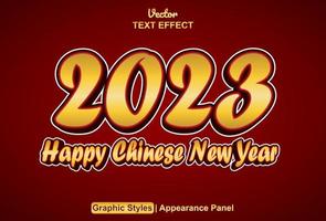 text effect happy chinese new year 2023 with graphic style and editable. vector