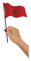 Female hand gently holds small morocco flag. Holiday design element. Cartoon vector on white background