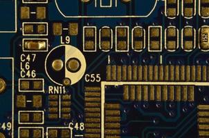 Close up of colored micro circuit board. Abstract technology background photo