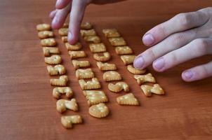 Hands on cracker keyboard buttons photo