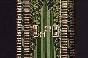 Close up of colored micro circuit board. Abstract technology background photo