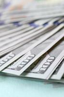 Macro shot with shallow depth of field. Hundred US dollar bills photo