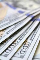 Macro shot with shallow depth of field. Hundred US dollar bills photo