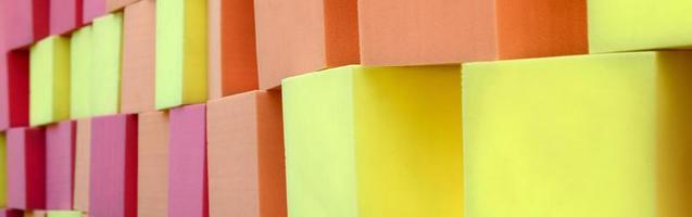 Wall of paralon soft cubes in dry pool, trampoline in the childrens center photo