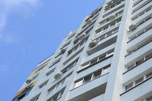 New multy storey residential building and blue sky photo