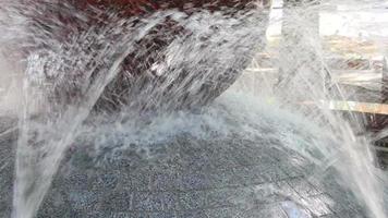 large stream of water rises from the fountain in the middle of the lake video