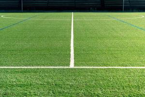 Soccer field with a new artificial turf field photo