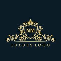 Letter NM logo with Luxury Gold Shield. Elegance logo vector template.