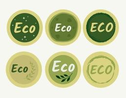 Set of round eco stickers, badges, icons, buttons with leaves in green color