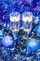 sparkling wine glasses in blue Xmas baubles
