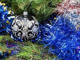 black glass Christmas balls, tinsel, Xmas tree 1