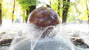 large stream of water rises from the fountain in the middle of the lake video