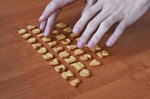 Hands on cracker keyboard buttons photo