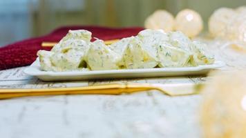 Such a tender potato salad with mastard, mayonnaise, red onion and dill. Wath the recipe in video