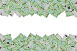 Rear part of 100 euro banknote close-up with small green details photo