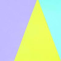 Texture background of fashion pastel colors. Violet, yellow, and blue geometric pattern papers. minimal abstract photo