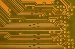 Close up of colored micro circuit board. Abstract technology background photo