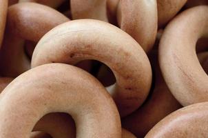 Close-up photo of fresh yellow bagels. A popular kind of flour products. One of the traditional Russian treats for tea