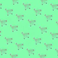 Shopping addiction, shopping lover or shopaholic concept. Many small empty shopping carts perform a pattern on a pastel colored paper background. Flat lay composition, top view photo