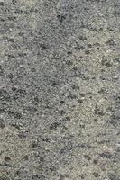 Monochromatic texture of granite surface photo