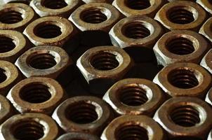 Close-up of rusty nuts photo
