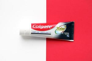 TERNOPIL, UKRAINE - JUNE 23, 2022 Colgate toothpaste, a brand of oral hygiene products manufactured by American consumer-goods company Colgate-Palmolive photo