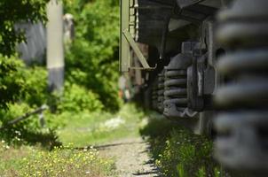 Landscape with a details of old grunge freight train photo