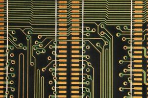 Close up of colored micro circuit board. Abstract technology background photo