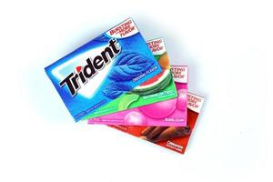 KHARKIV, UKRAINE - MARCH 15, 2022 Packs of Trident gums. Trident was introduced in 1964 as one of the first patented sugarless gums photo