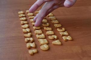 Hands on cracker keyboard buttons photo