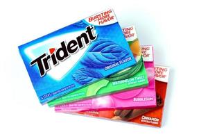 KHARKIV, UKRAINE - MARCH 15, 2022 Packs of Trident gums. Trident was introduced in 1964 as one of the first patented sugarless gums photo