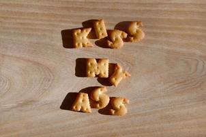 Kiss my ass. Heap of edible letters photo