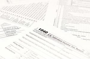 Blank income tax forms. American 1040 Individual Income Tax return form photo