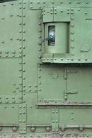 Abstract green industrial metal textured background with rivets and bolts photo